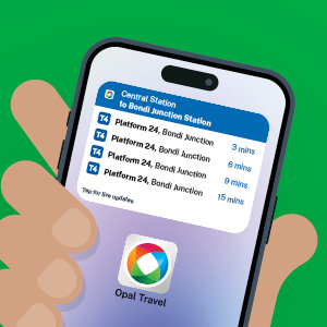 Hand holding a phone showing Opal Travel app with train times from Central Station to Bondi Junction.