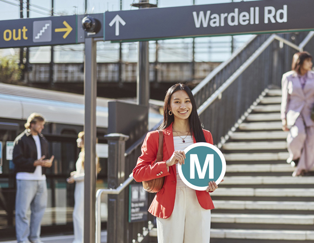 SW Metro passenger holding sign