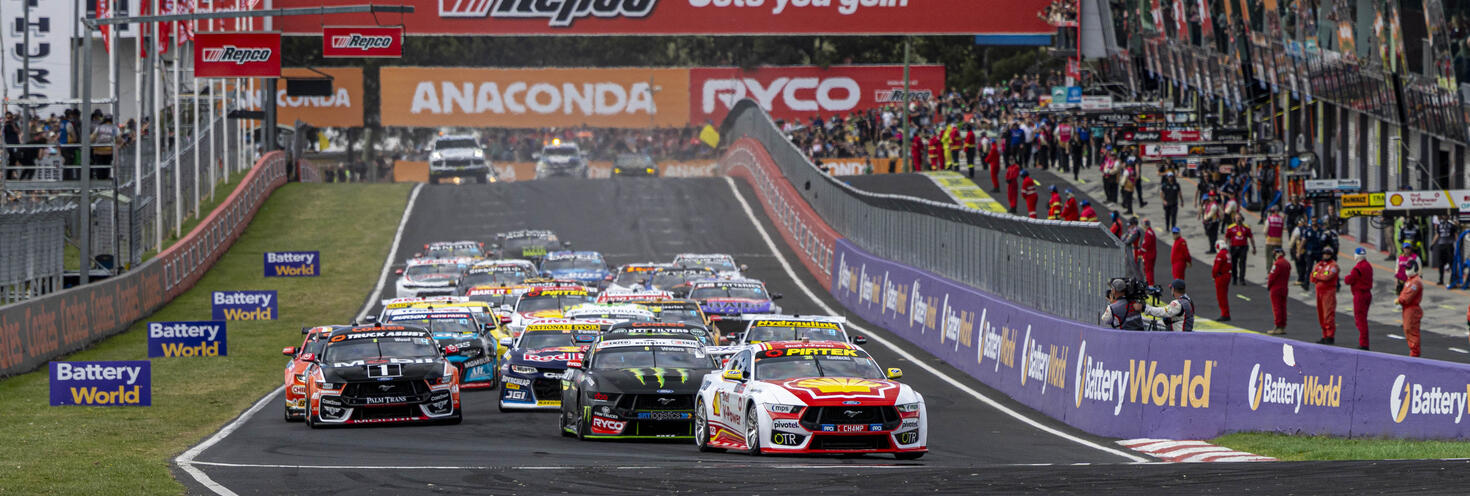 V8 Supcars racing on the straight about to turn first corner