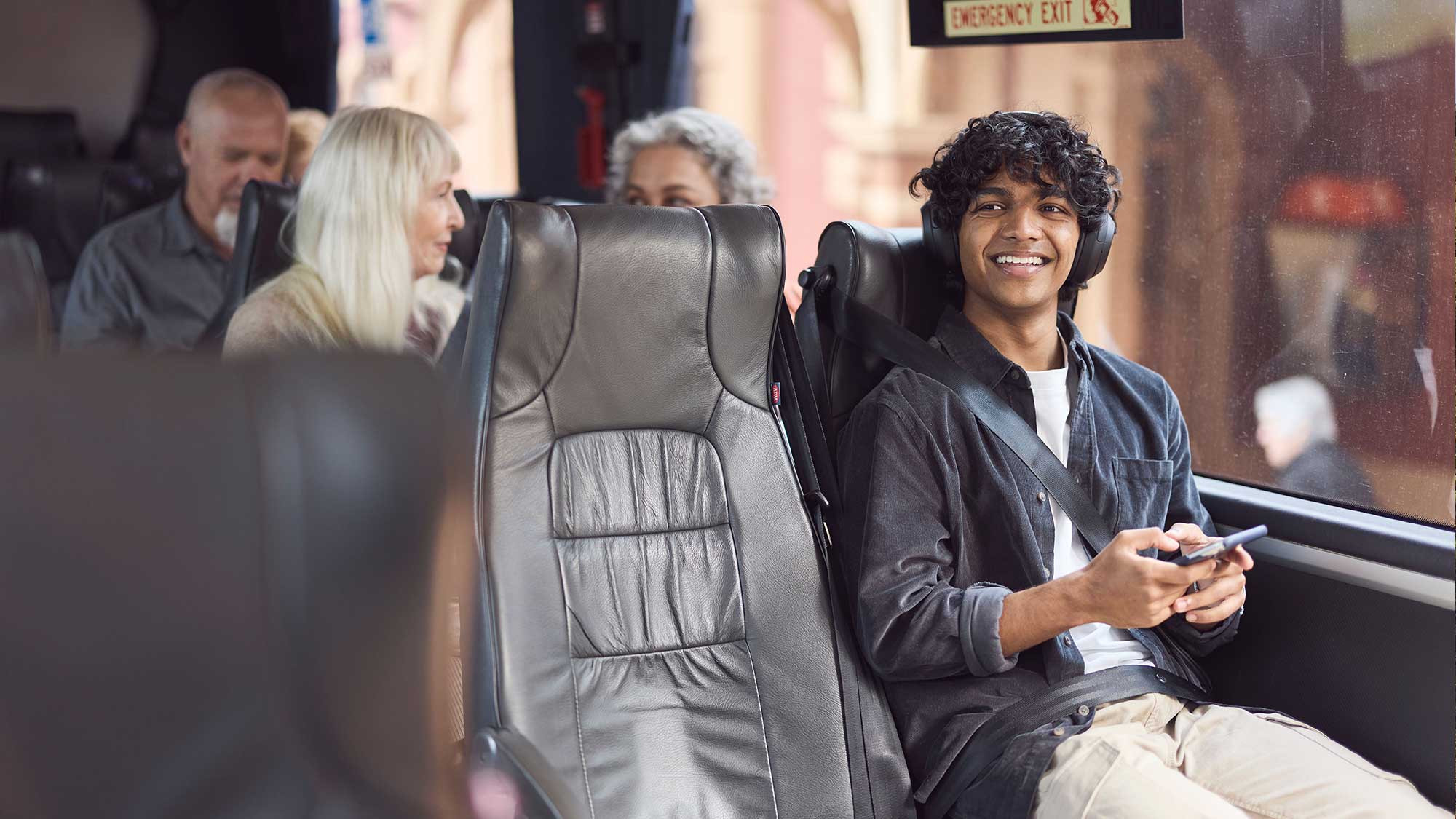 NSWTrainlink-regional-coach-seat-man-headphones122586-2.jpg