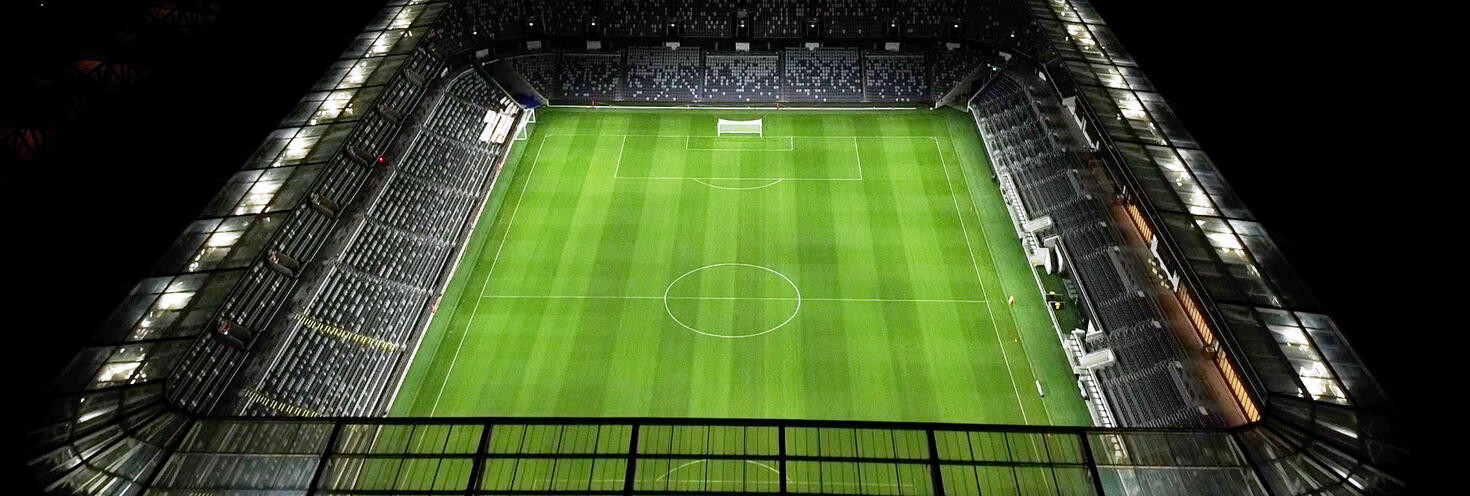 Western Syd Stadium interior nighttime