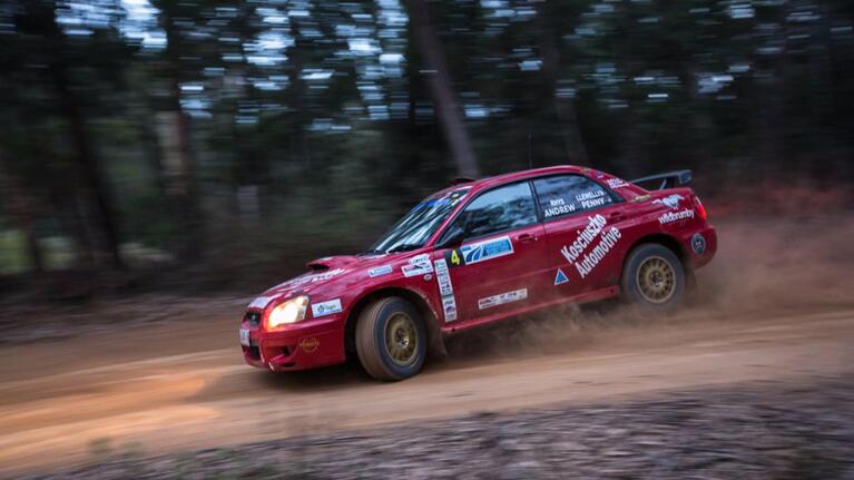 Race car on dirt forest road at the Narooma Forest Rally