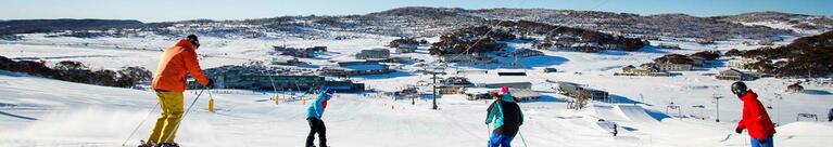 Skiiers and snowboarders at Perisher snowfields